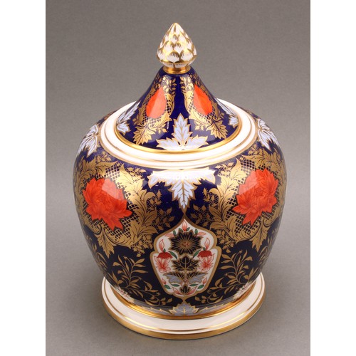 78 - A large Hamilton Derby Imari pattern hexagonal jar and cover, pine cone finial, 43cm high, printed m... 