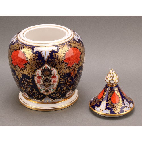 78 - A large Hamilton Derby Imari pattern hexagonal jar and cover, pine cone finial, 43cm high, printed m... 