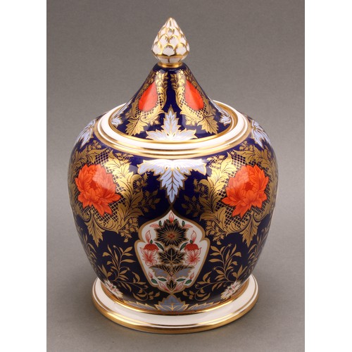 78 - A large Hamilton Derby Imari pattern hexagonal jar and cover, pine cone finial, 43cm high, printed m... 