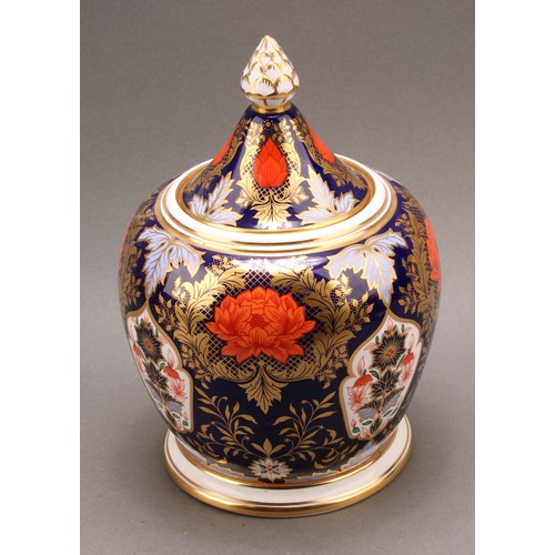 78 - A large Hamilton Derby Imari pattern hexagonal jar and cover, pine cone finial, 43cm high, printed m... 