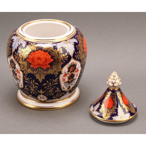 78 - A large Hamilton Derby Imari pattern hexagonal jar and cover, pine cone finial, 43cm high, printed m... 