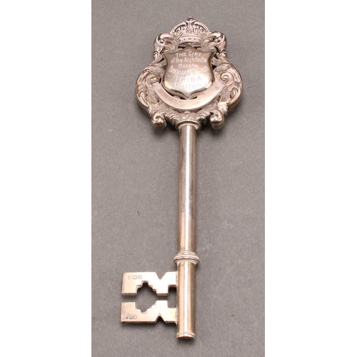 1091 - Copoclephily - an Edwardian silver presentation key, Presented to Mr Thomas Killon, JP, Chairman of ... 