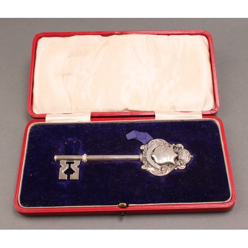 1091 - Copoclephily - an Edwardian silver presentation key, Presented to Mr Thomas Killon, JP, Chairman of ... 