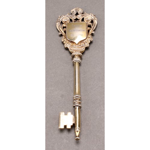 1091 - Copoclephily - an Edwardian silver presentation key, Presented to Mr Thomas Killon, JP, Chairman of ... 