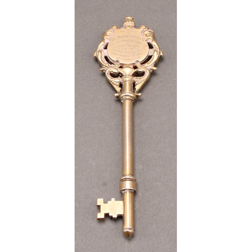 1083 - Copoclephily - a George V silver-gilt and enamel presentation key, ...On the Opening of the Torquay ... 