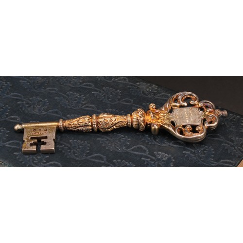 1099 - Copoclephily - Military Interest - a Victorian Scottish silver-gilt presentation key, Presented to M... 