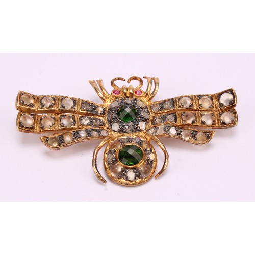 1216 - A multi gem insect pendant brooch, as a fly, set with two green tourmalines, two spinel eyes, twenty... 