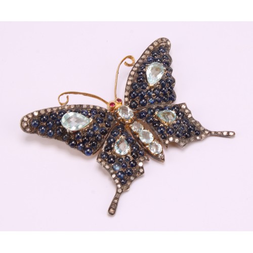 1212 - A large multi gem butterfly brooch, set with seventy two rose cut diamonds, eighty eight blue caboch... 