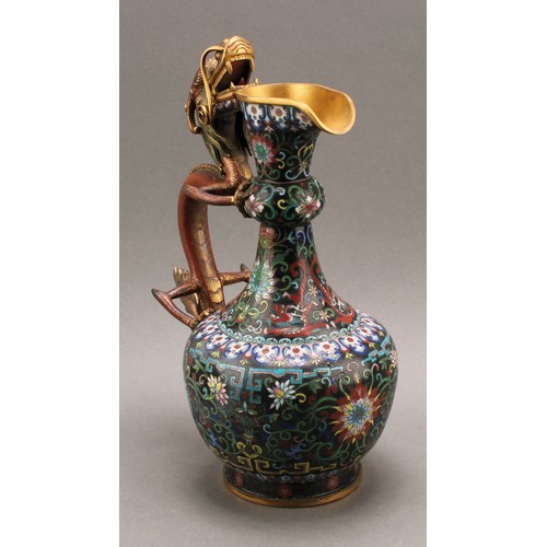 1281 - A Chinese cloisonne enamel ewer, brightly decorated in polychrome with flowers and dragons, dragon h... 