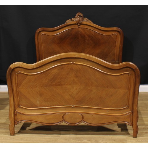 1939 - A Louis XV style bed, the headboard 135cm high, the internal 188cm x 132cm