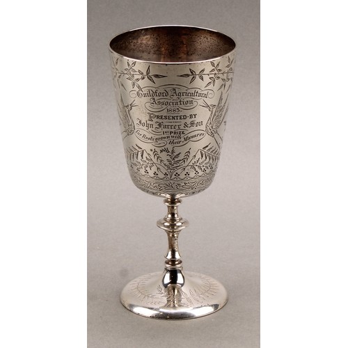 990 - An Aesthetic Movement pedestal goblet, bright-cut engraved with cranes and Japanesque foliage, domed... 