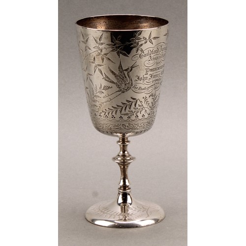 990 - An Aesthetic Movement pedestal goblet, bright-cut engraved with cranes and Japanesque foliage, domed... 