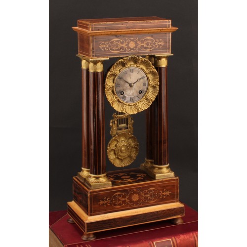 2449 - A French rosewood and marquetry inlaid portico mantel clock, the frieze supported by four stylised g... 