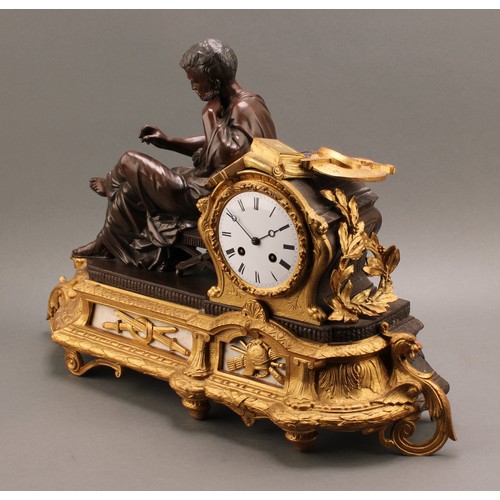 2445 - A French Empire style spelter and ormolu mounted mantel clock, 9.5cm enamel dial, Roman numerals, tw... 