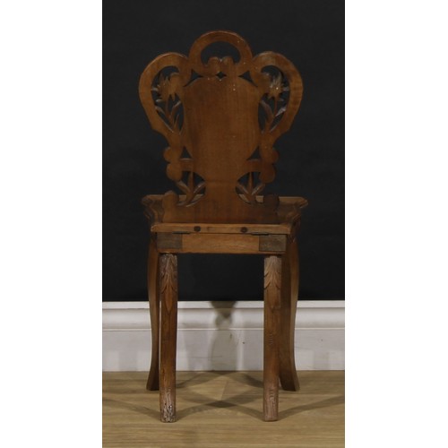 1524 - An unusual Black Forest musical child’s chair, the sprung seat enclosing a music box movement, 64.5c... 