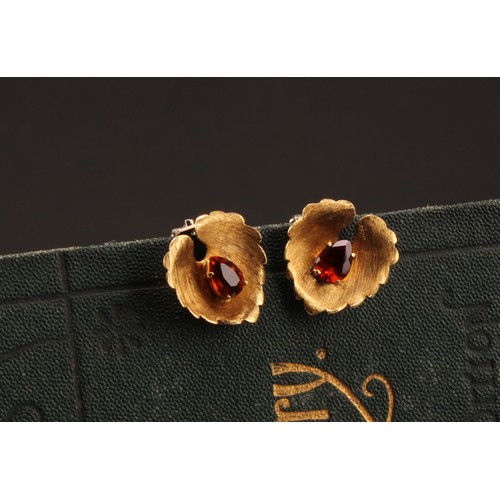 1217 - A pair of 18ct gold garnet leaf clip on earrings, spring clip fittings, import marks London 1966, 6g... 