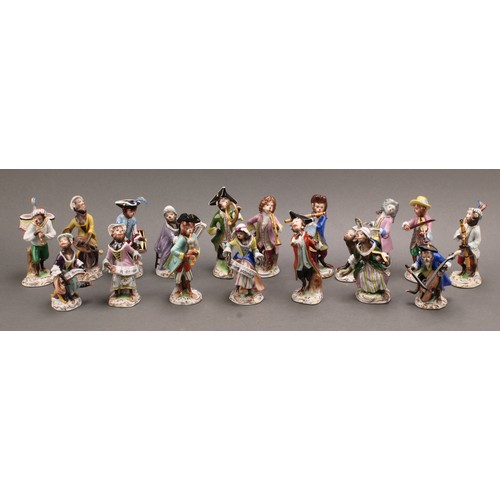 278 - A Volkstedt porcelain seventeen-piece monkey band, after the Meissen originals, in animated poses, p... 