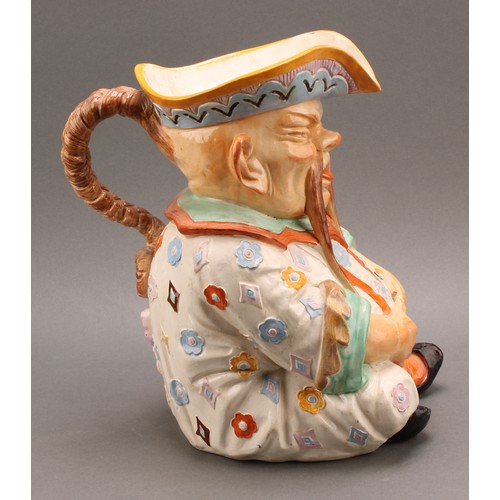 8 - A large Continental majolica character jug, as a seated Chinaman, his plaited hair as the handle, de... 