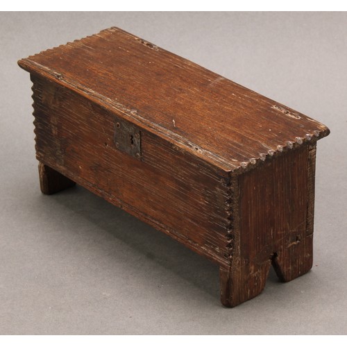 1966 - Miniature Furniture - a 17th century design oak six-plank chest, notched borders, V-shaped end suppo... 