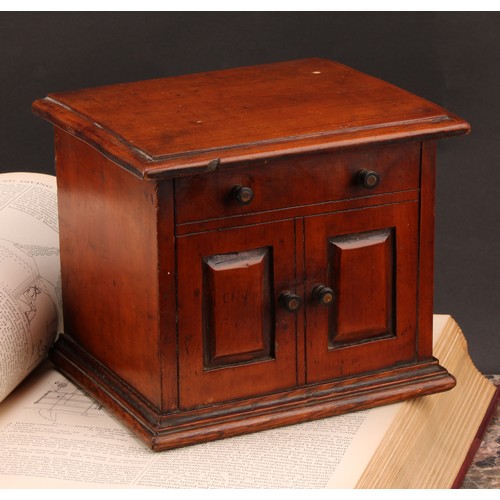 2442 - A Victorian walnut novelty tea caddy, as a miniature chest or cabinet, hinged cover enclosing a lidd... 