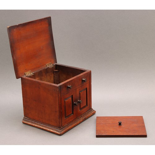 2442 - A Victorian walnut novelty tea caddy, as a miniature chest or cabinet, hinged cover enclosing a lidd... 