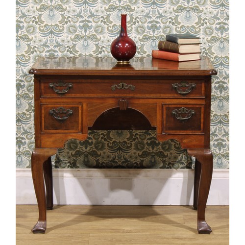 2361 - A George II red walnut lowboy, slightly oversailing crossbanded top with moulded edge and reentrant ... 