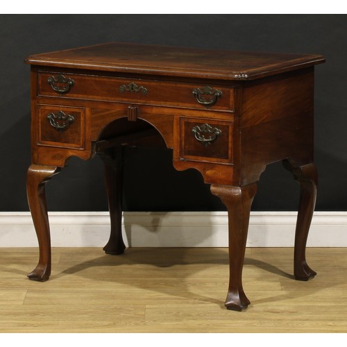 2361 - A George II red walnut lowboy, slightly oversailing crossbanded top with moulded edge and reentrant ... 