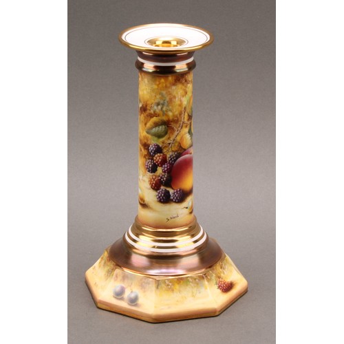 131 - A pair of Royal Worcester candlesticks, painted by Sally Wood, signed, with ripe fruit on a mossy ba... 