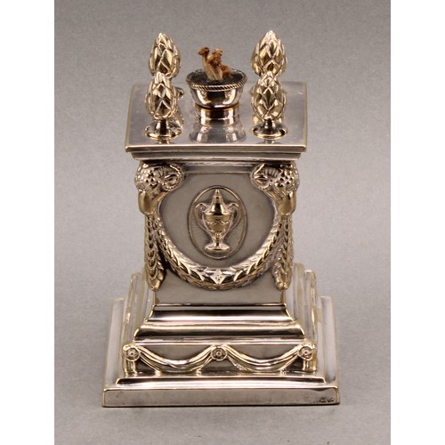 700 - A Victorian silver plated table lighter, in the Adam Revival taste, as a pedestal, in relief with sw... 