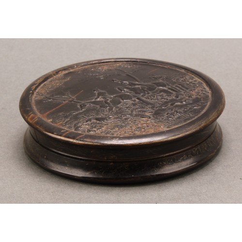 1417 - A 19th century pressed horn waisted circular snuff box, the push-fitting cover with a titled hunting... 