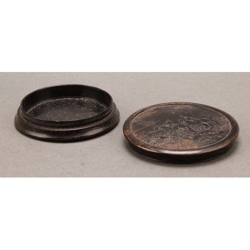 1417 - A 19th century pressed horn waisted circular snuff box, the push-fitting cover with a titled hunting... 