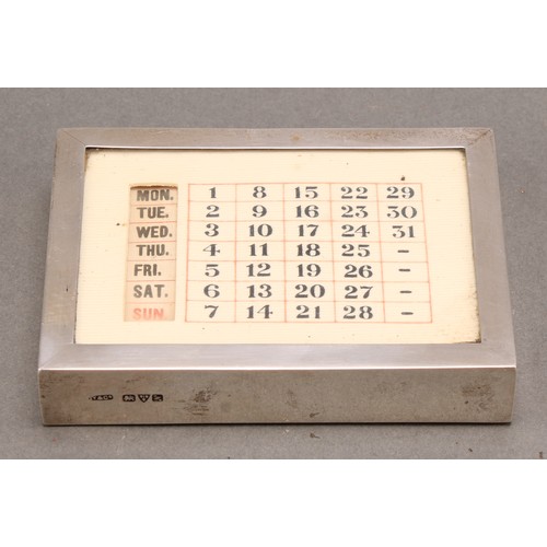 810 - A George V silver combination desk weight and perpetual calendar, ivorine fittings, 9.5cm wide, Grey... 