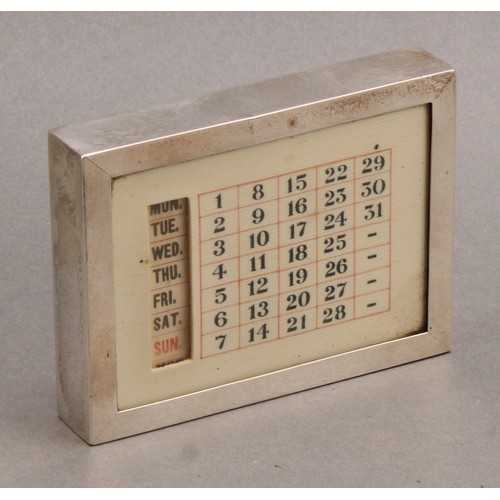 810 - A George V silver combination desk weight and perpetual calendar, ivorine fittings, 9.5cm wide, Grey... 