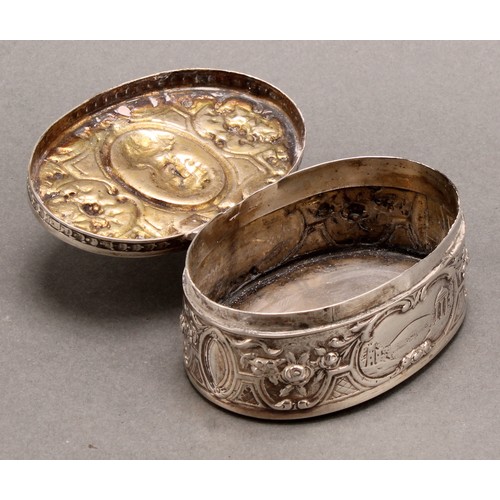 854 - A pair of 19th century German silver oval snuff boxes, hinged covers chased with portraits of Louis ... 