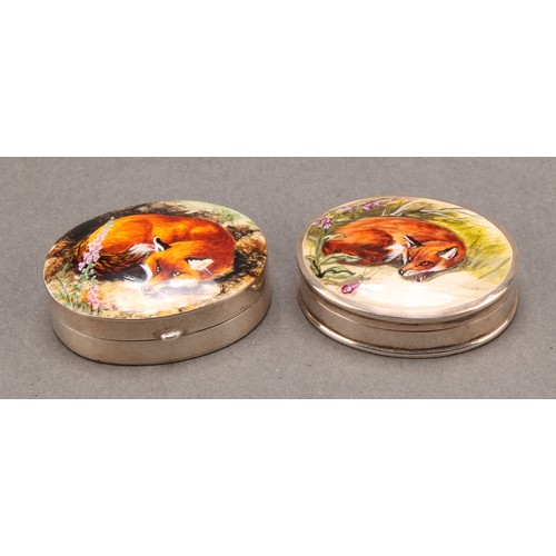 916 - A silver and enamel oval pill box, decorated with a curled up fox, 38mm wide, import marks for Hansf... 