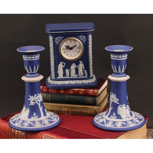 80 - A late Victorian Wedgwood Jasperware mantel clock, typically sprigged in white with classical scenes... 