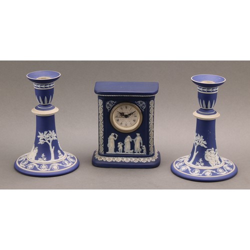 80 - A late Victorian Wedgwood Jasperware mantel clock, typically sprigged in white with classical scenes... 