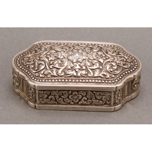 714 - A 19th century Indian silver snuff box, chased and engraved with scrolling foliage, hinged cover, 8c... 