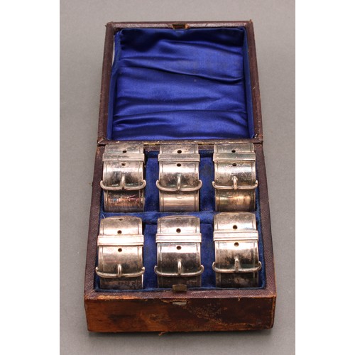 689 - A set of six Edwardian E.P.N.S novelty napkin rings, each as a buckled collar, 4.5cm diam, c.1905, c... 