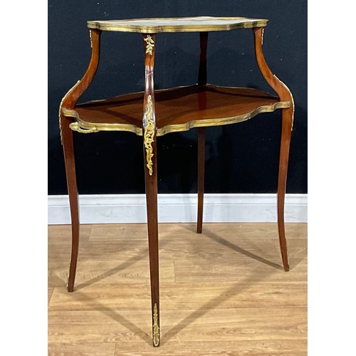 1941 - A Louis XV style gilt metal mounted onyx and mahogany table à thé, 87cm high, 82cm wide, 48.5cm deep... 