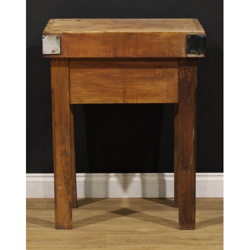 2472 - The Country House Kitchen - an iron bound oak butcher’s block, 88cm high, 70cm wide, 58cm deep