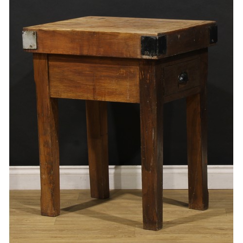 2472 - The Country House Kitchen - an iron bound oak butcher’s block, 88cm high, 70cm wide, 58cm deep