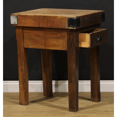 2472 - The Country House Kitchen - an iron bound oak butcher’s block, 88cm high, 70cm wide, 58cm deep