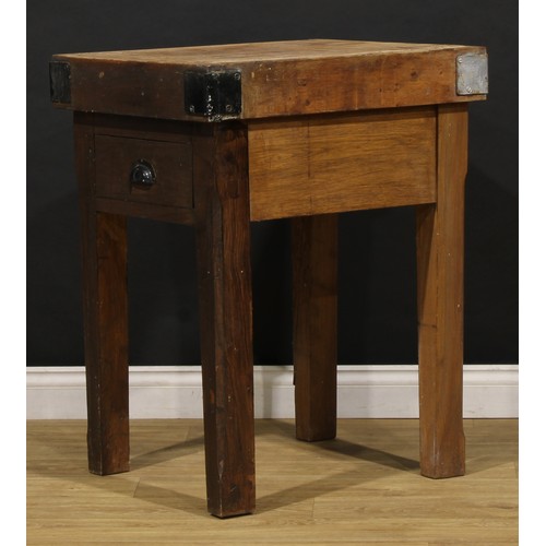 2472 - The Country House Kitchen - an iron bound oak butcher’s block, 88cm high, 70cm wide, 58cm deep