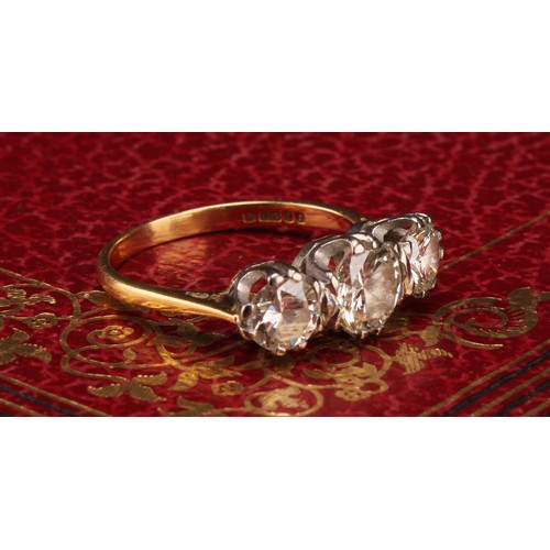 1203 - A diamond ring, central round brilliant cut diamond measuring 6.38 x 6.30 x 3.69mm, calculated diamo... 