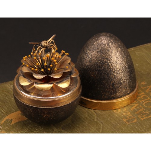 1129 - Stuart Devlin (1931-2018) - an Elizabeth II silver gilt surprise egg, enclosing a bee on a flower, n... 