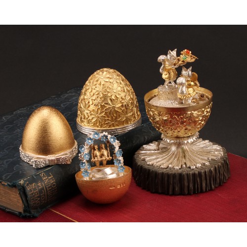 1079 - Christopher Nigel Lawrence (Bn.1936) - an Elizabeth II silver and silver-gilt musical surprise egg, ... 