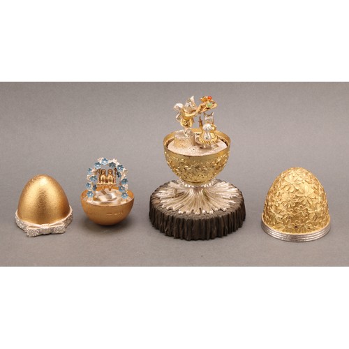 1079 - Christopher Nigel Lawrence (Bn.1936) - an Elizabeth II silver and silver-gilt musical surprise egg, ... 