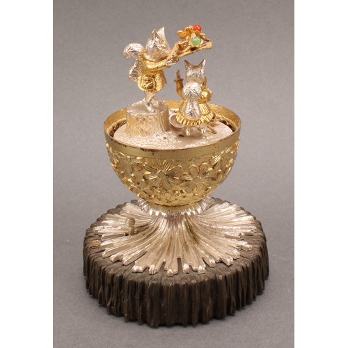 1079 - Christopher Nigel Lawrence (Bn.1936) - an Elizabeth II silver and silver-gilt musical surprise egg, ... 