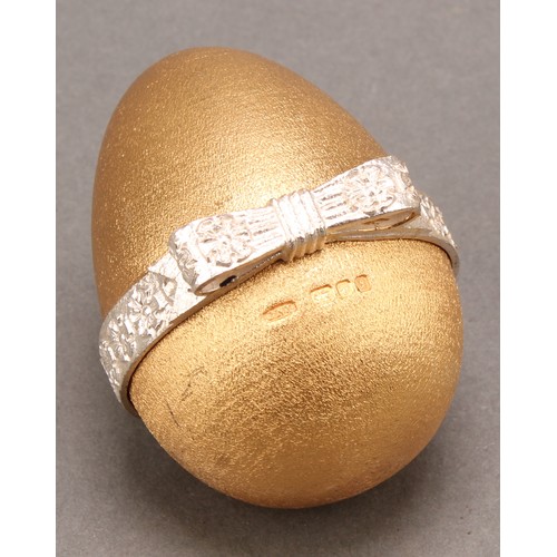 1079 - Christopher Nigel Lawrence (Bn.1936) - an Elizabeth II silver and silver-gilt musical surprise egg, ... 